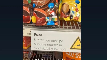 Olandezii au lipit mesaje în limba română la rafturile din supermaketuri Nu fura. Suntem cu ochii pe bunurile noastre