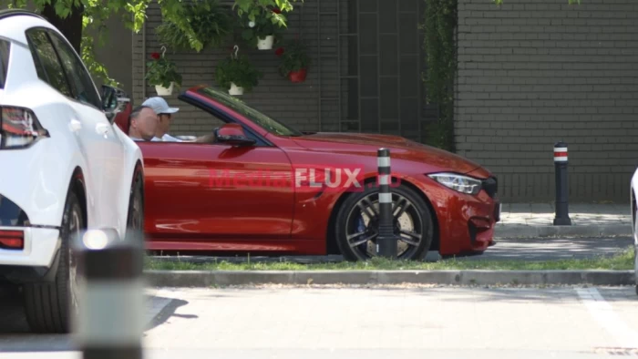 Ștefan Bănică Junior, cu BMW-ul decapotabil prin București